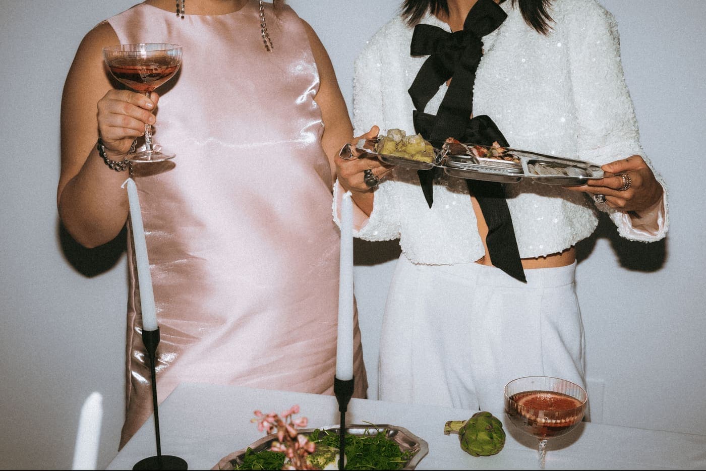 Guests being served drinks and canapés at a wedding